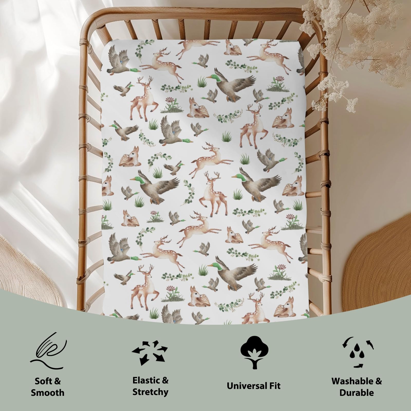 ZoUbqchY crib sheet features deer and leaves for nature-inspired nursery atmosphere.