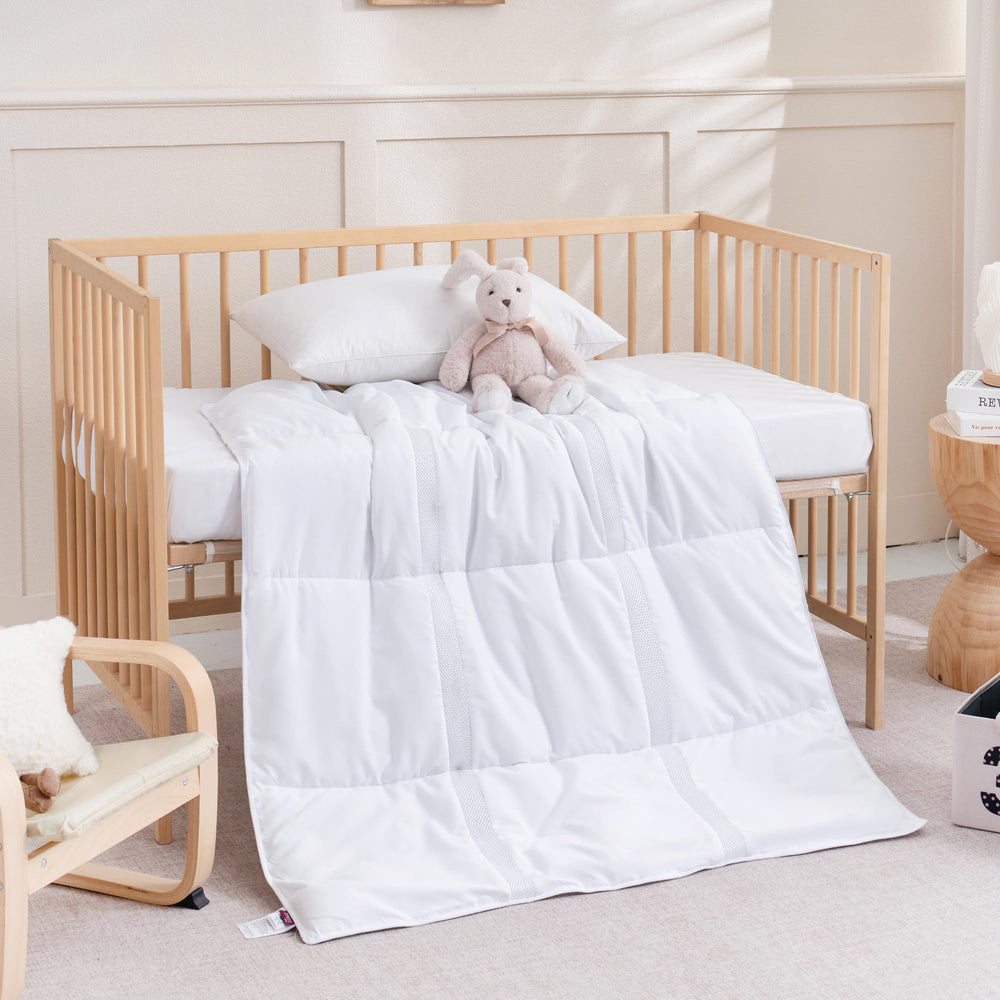 ZPECC toddler comforter bed scene conveys durable, wrinkle-resistant design for busy families.
