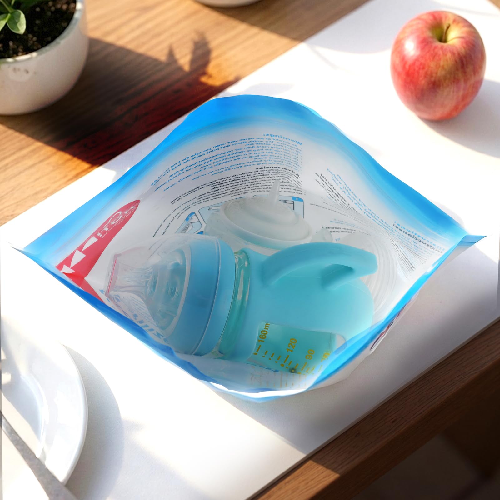 Zucube Bebé travel scene showing compact sterilizer bag in use.