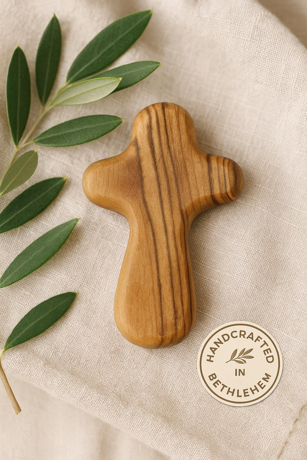 Zuluf olive wood cross wall display, elegant centerpiece for sacred space.