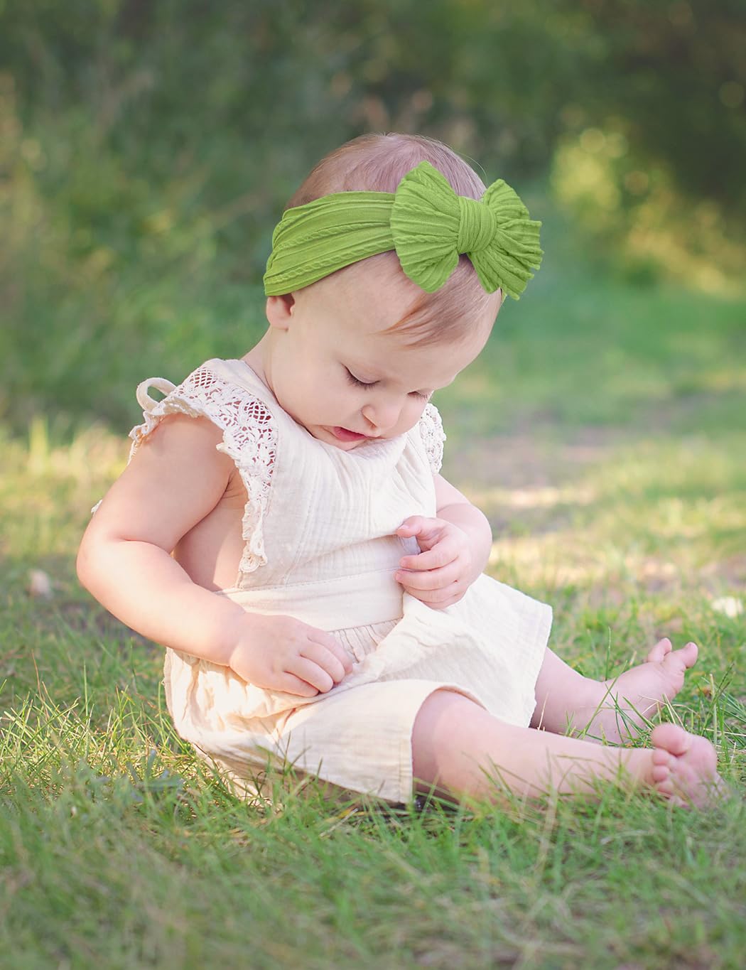ZURLEFY baby headbands worn by infant during playtime.