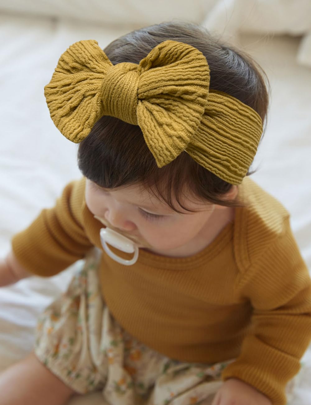 ZURLEFY gray headband bow worn during playtime, comfortable stretch.