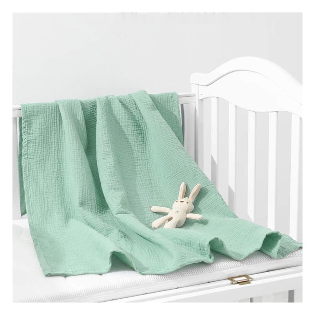 ZURLEFY Sage Green baby swaddle blanket close-up, soft muslin fabric for gentle newborn comfort.