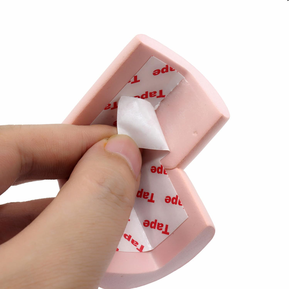 ZXUEZHENG pink table-edge padding protects tabletops while children play.