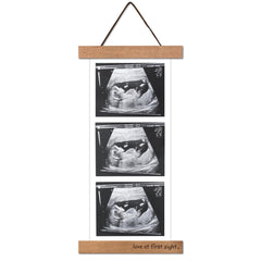 Zyeco wooden keepsake frame for ultrasound photos in nursery displays.