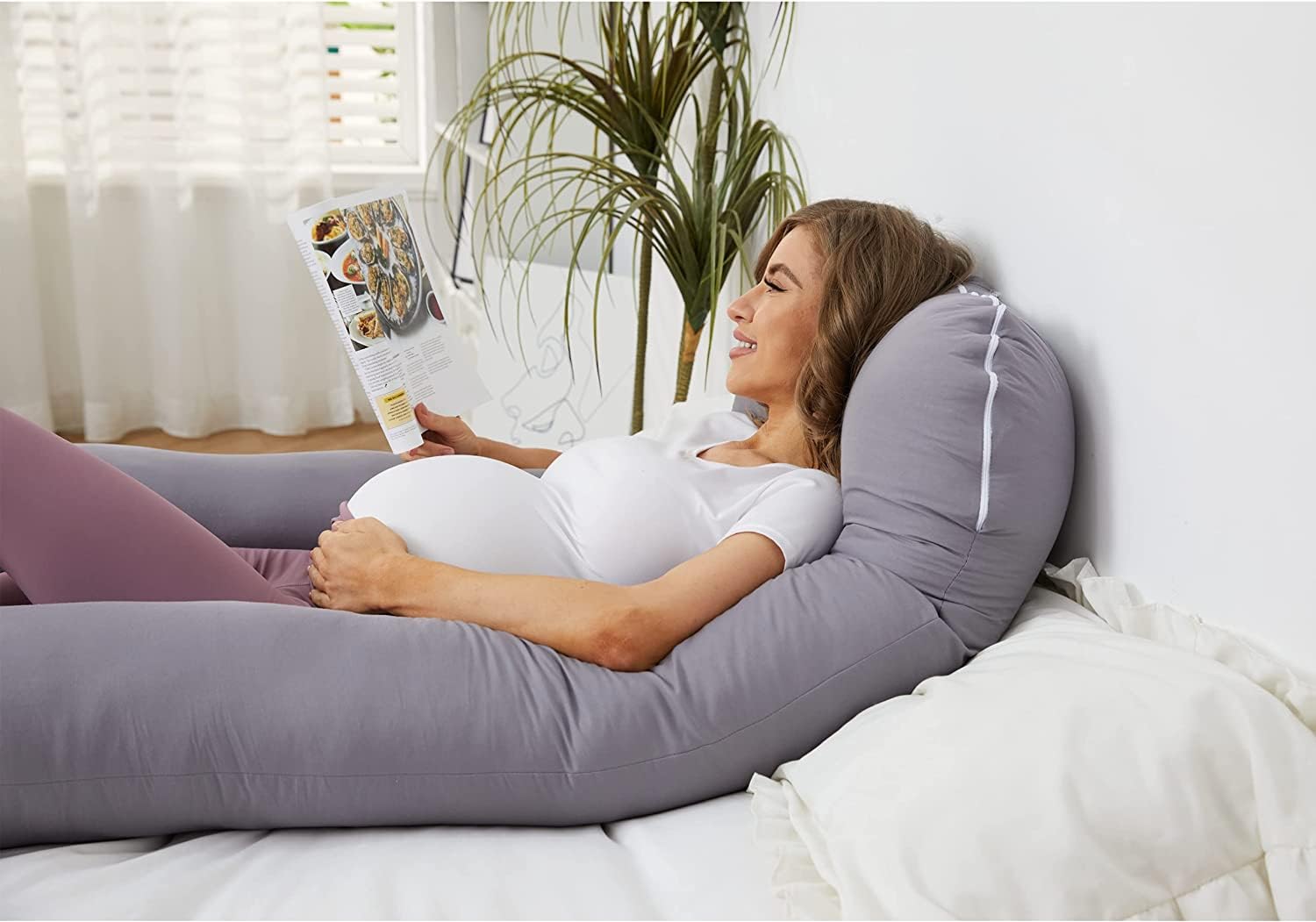 ZZZhen belly support for side-sleeping comfort during pregnancy.